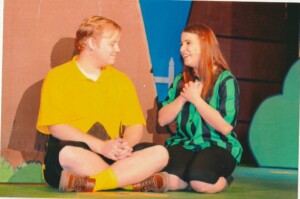 Charlie Brown and Peppermint Patty sitting on the floor talking