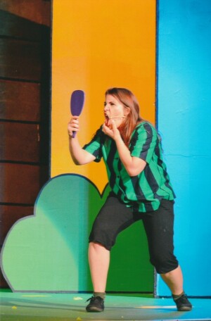 Peppermint Patty pulling faces at herself in a mirror