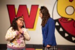Veronica and Martha talking on stage