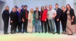 Cast and crew of Gasp standing on stage with playwright Ben Elton