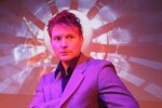 Image of Joel Coyle as Sandy on stage