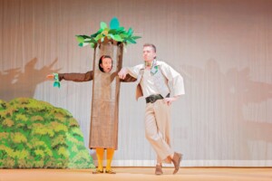 Jack leaning on Trumpet who is disguised as a tree