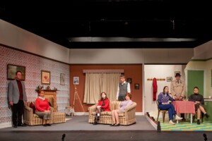 Cast of Pack of Lies in tableau on set